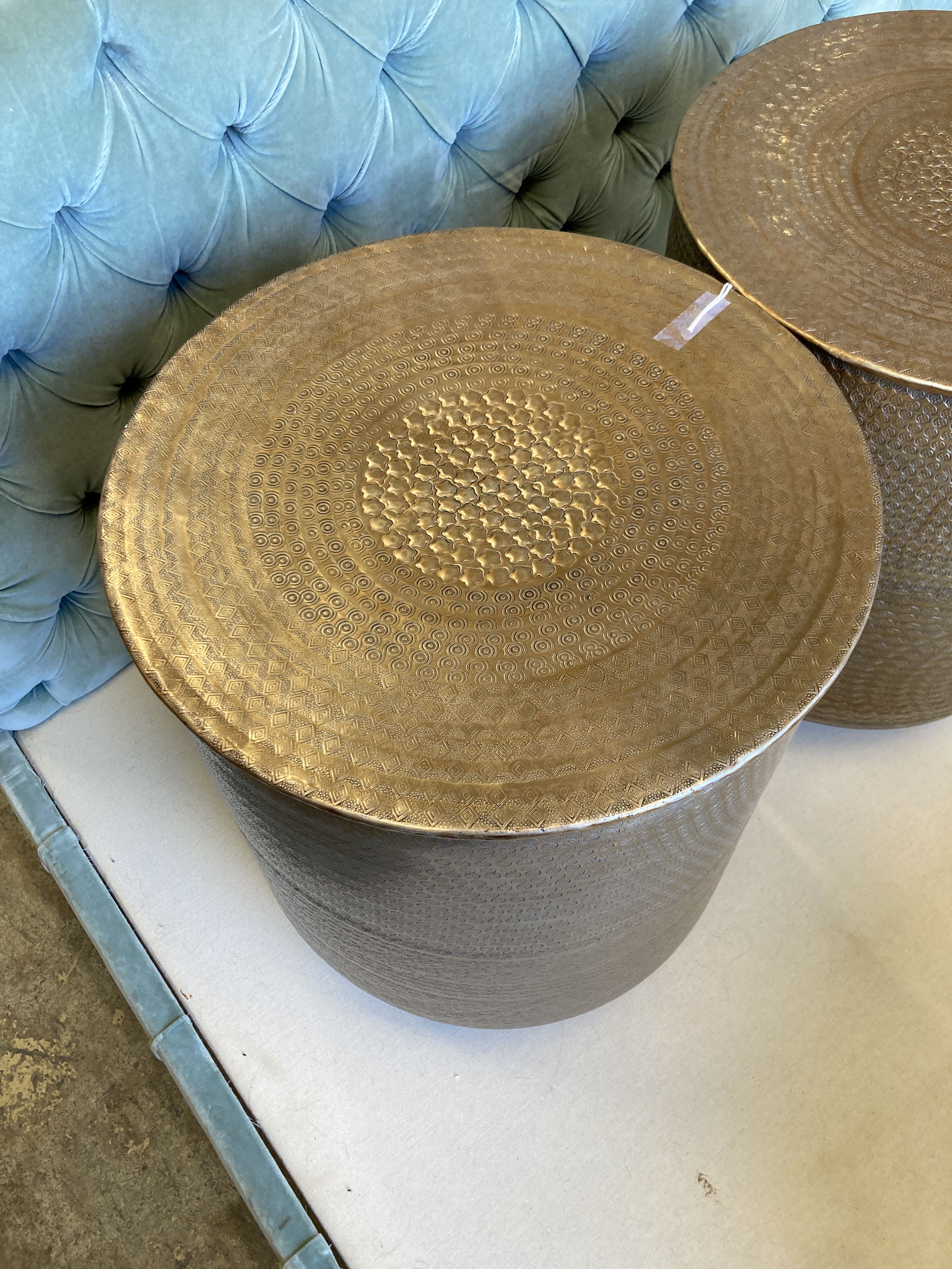 A pair of contemporary Indian brass drum coffee tables, diameter 45cm
